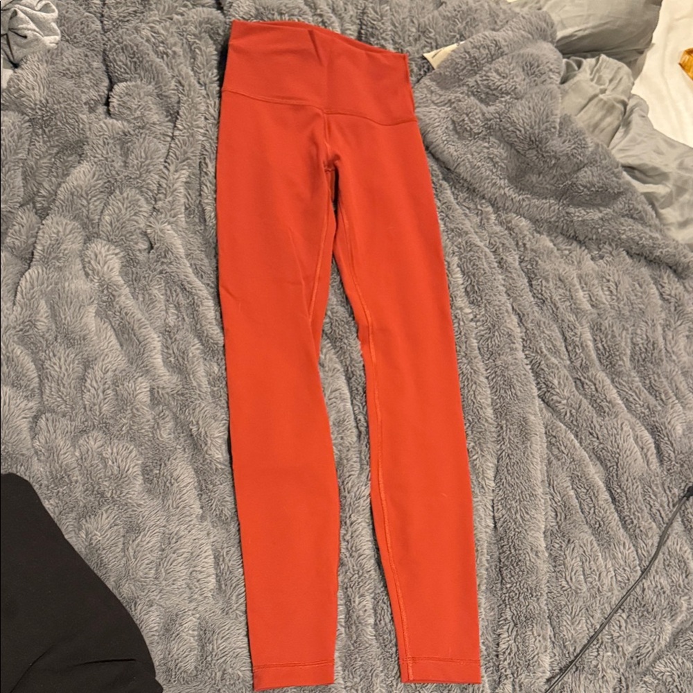 Lululemon burnt orange wundertrain leggings size 4